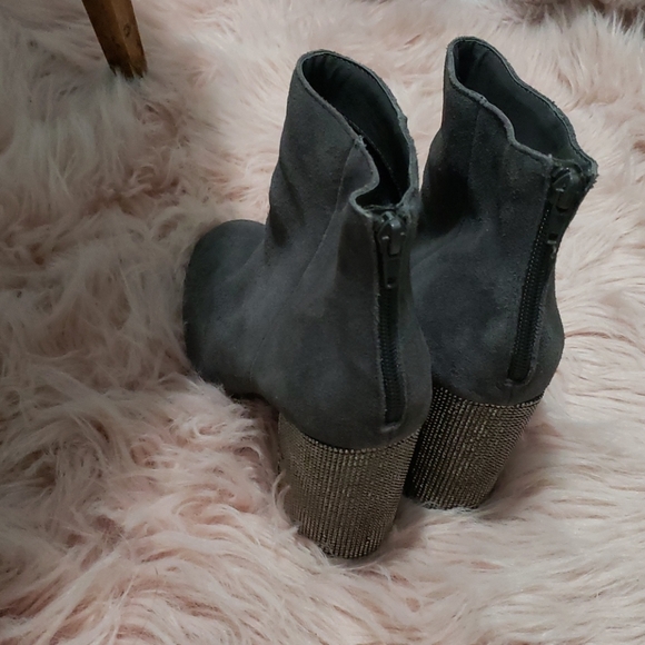 A pair of Kenneth Cole booties